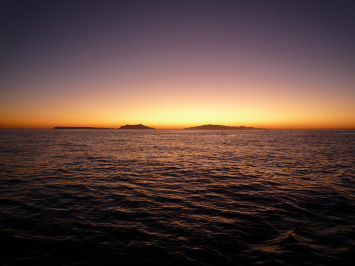 Night falls with colour on the ocean